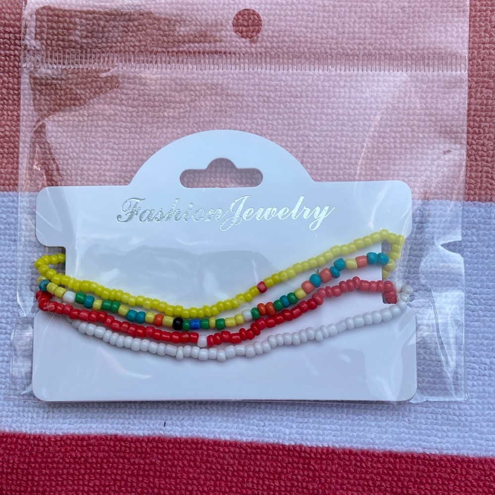 Set of 4 Stretchy anklets.  NWT.. handmade.